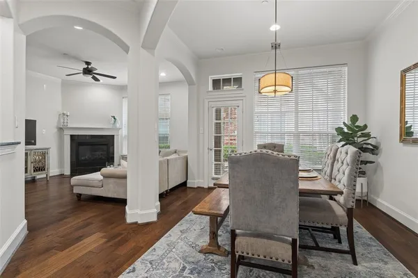 a view of a livingroom with furniture window and wooden floor