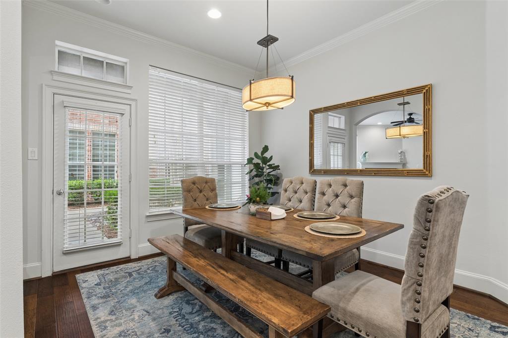 1600 Abrams Road, Unit 22 Dallas, TX 75214 - Photo 12 of 38 a dining room with furniture a chandelier and wooden floor