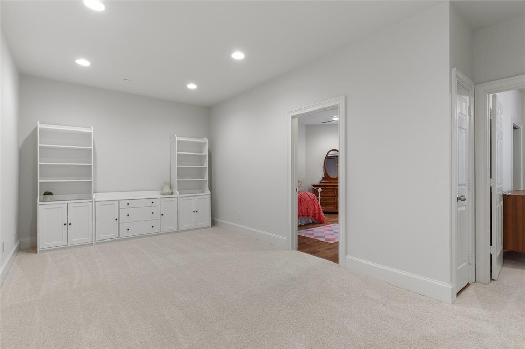 1600 Abrams Road, Unit 22 Dallas, TX 75214 - Photo 14 of 38 an empty room with cabinet and mirrors