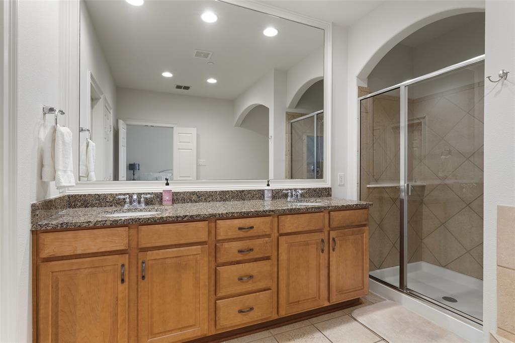 1600 Abrams Road, Unit 22 Dallas, TX 75214 - Photo 20 of 38 a bathroom with double sink and a mirror