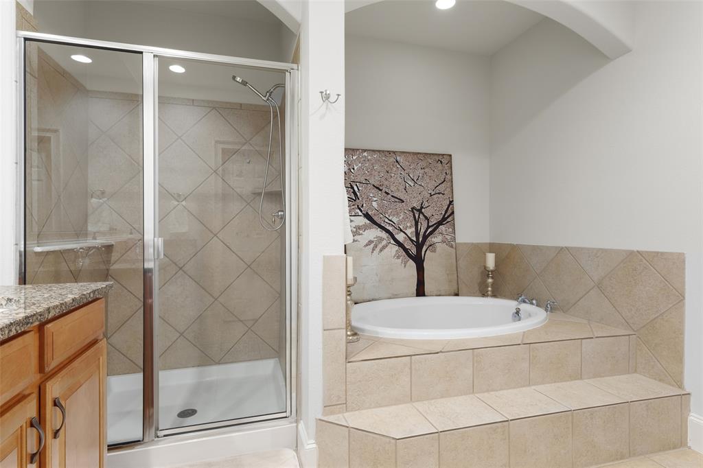 1600 Abrams Road, Unit 22 Dallas, TX 75214 - Photo 22 of 38 a bathroom with a toilet and a shower