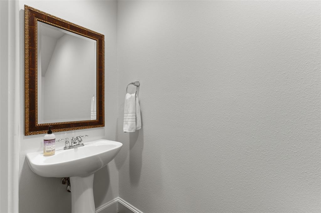 1600 Abrams Road, Unit 22 Dallas, TX 75214 - Photo 24 of 38 a bathroom with a sink and a mirror