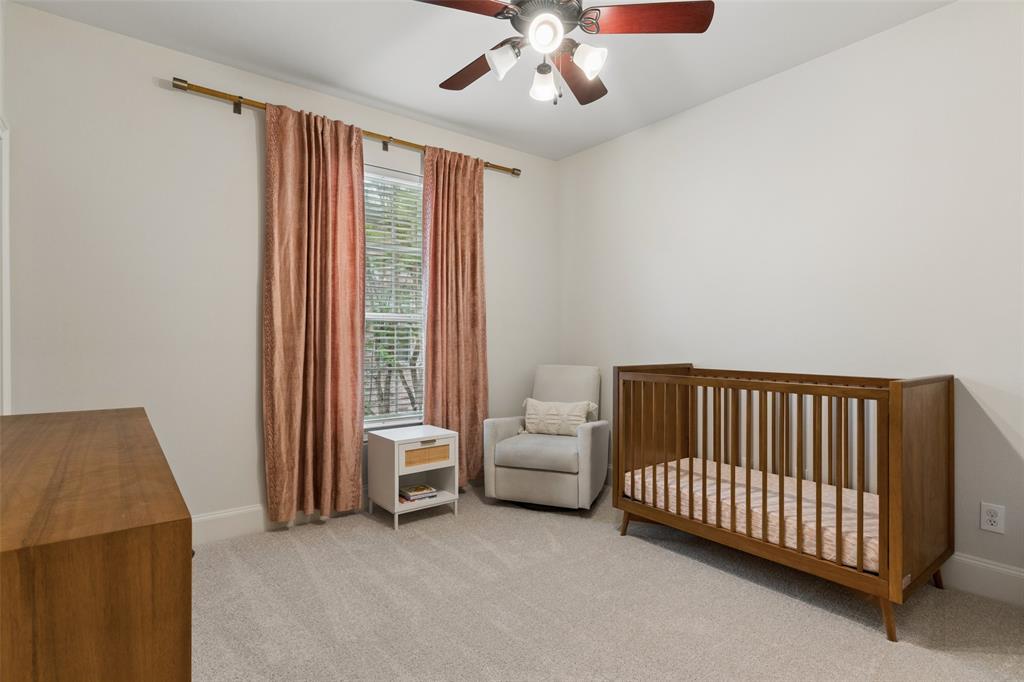 1600 Abrams Road, Unit 22 Dallas, TX 75214 - Photo 25 of 38 a view of a bedroom with furniture and staircase