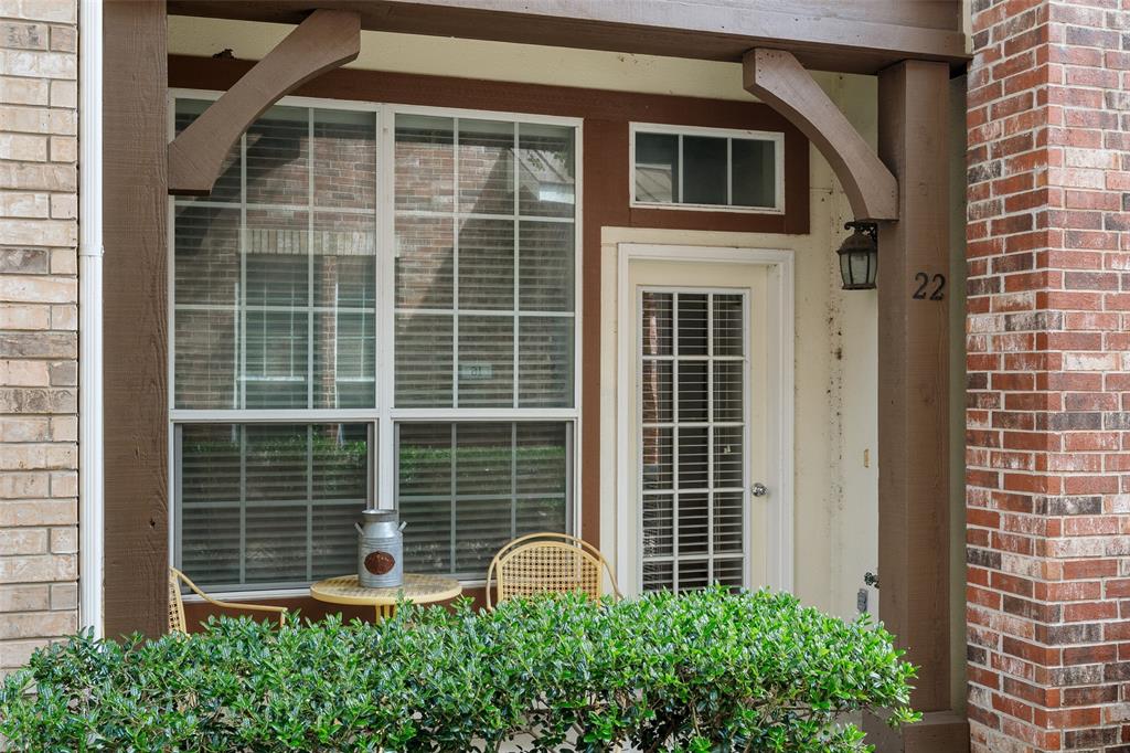 1600 Abrams Road, Unit 22 Dallas, TX 75214 - Photo 30 of 38 a front view of a house with a yard