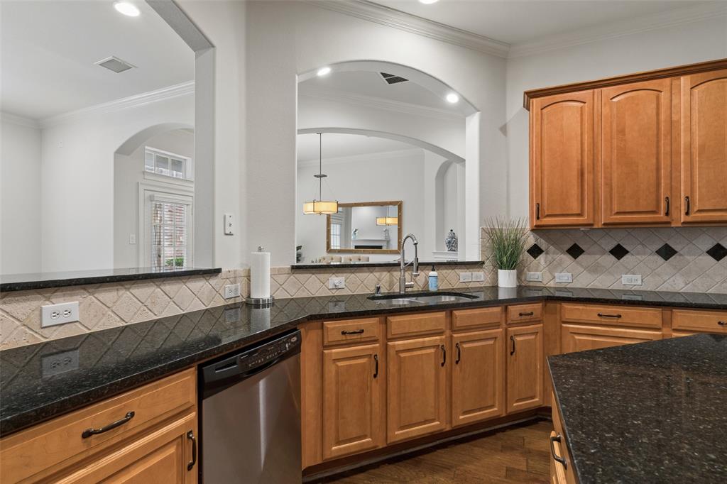 1600 Abrams Road, Unit 22 Dallas, TX 75214 - Photo 6 of 38 a kitchen with granite countertop a sink and cabinets