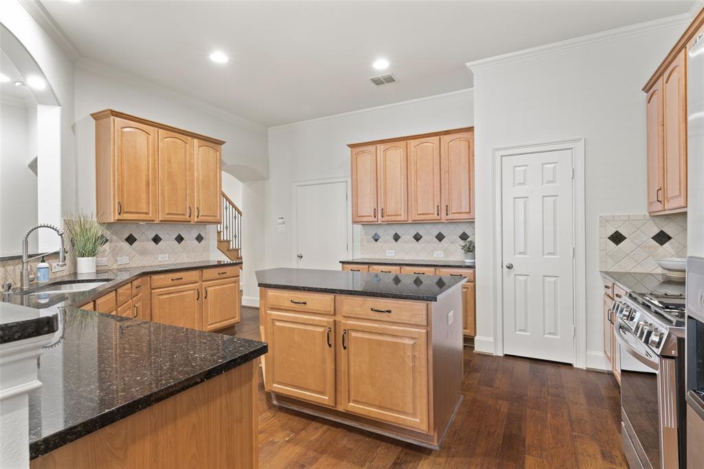 1600 Abrams Road, Unit 22 Dallas, TX 75214 - Photo 8 of 38 a kitchen with stainless steel appliances granite countertop a sink stove and cabinets