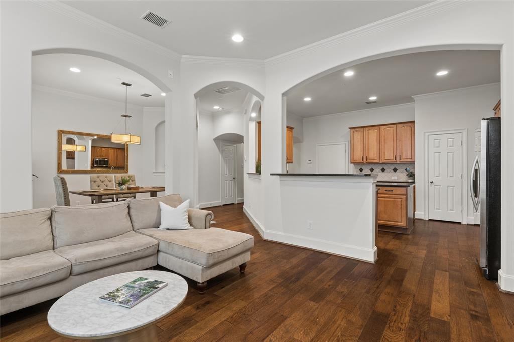 1600 Abrams Road, Unit 22 Dallas, TX 75214 - Photo 9 of 38 a living room with furniture and a wooden floor