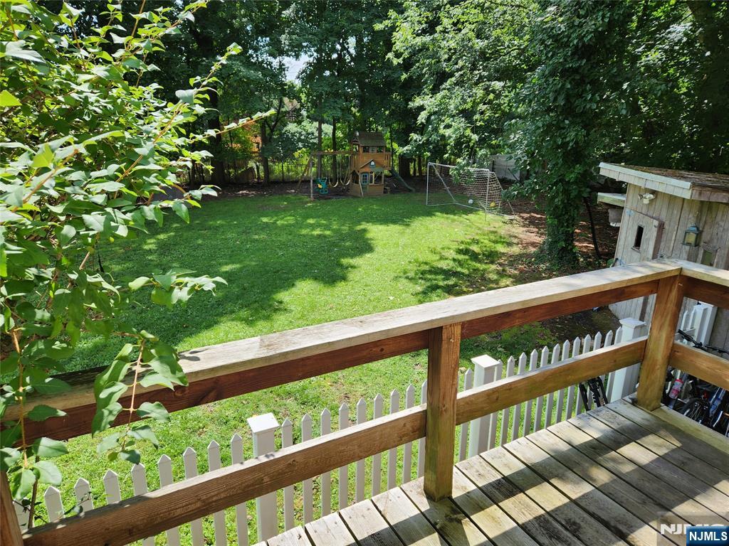 274 Franklin Turnpike, Unit GARAGE APART Ridgewood, NJ 07450 - Photo 11 of 11 a view of a wooden deck and a yard
