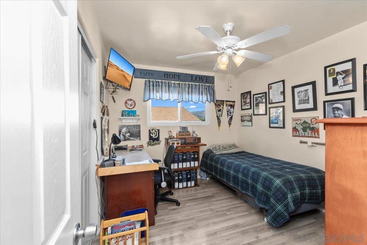 9254 Shadow Hill Road Santee, CA 92071 - Photo 19 of 34 a living room with furniture and wooden floor
