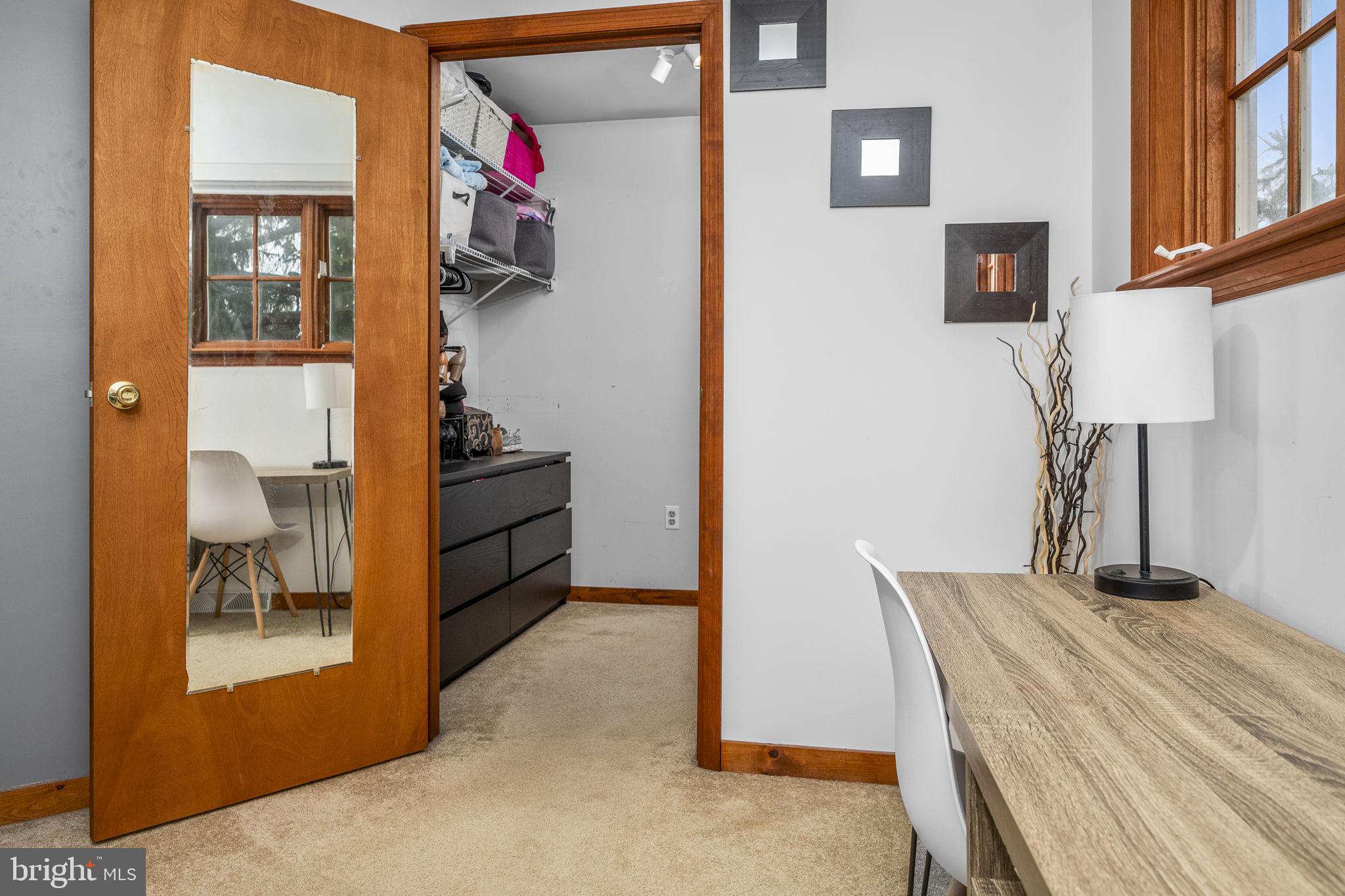332 North Cedar Street Lititz, PA 17543 - Photo 15 of 30 a bedroom with a bed and a mirror