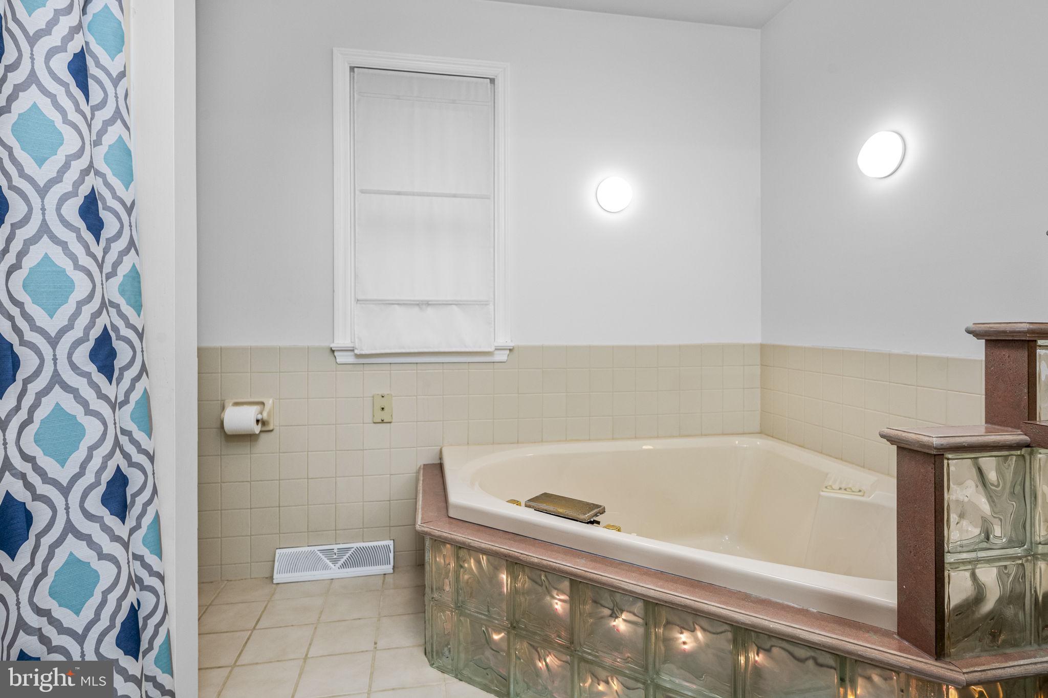 332 North Cedar Street Lititz, PA 17543 - Photo 21 of 30 a bathroom with a bathtub and shower