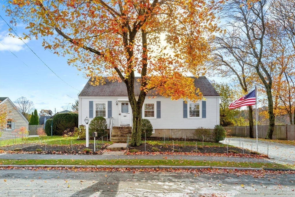 10 Wolcott Street Wakefield, MA 01880 - Photo 2 of 42 a front view of a house with garden