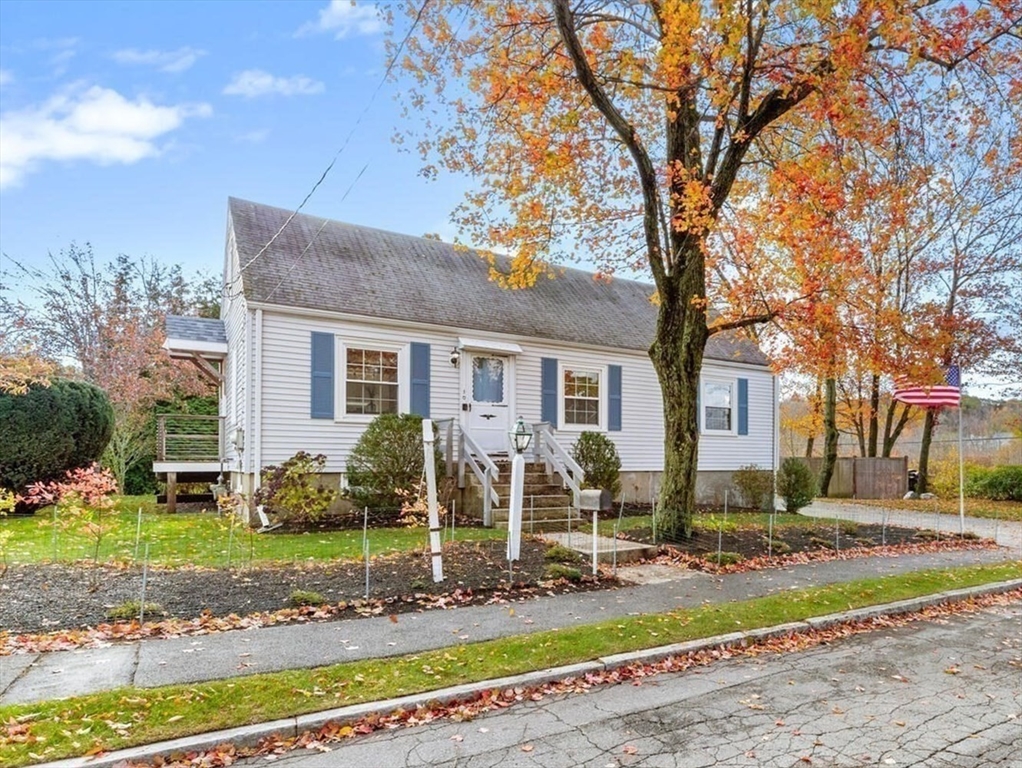 10 Wolcott Street Wakefield, MA 01880 - Photo 3 of 42 a front view of a house with garden