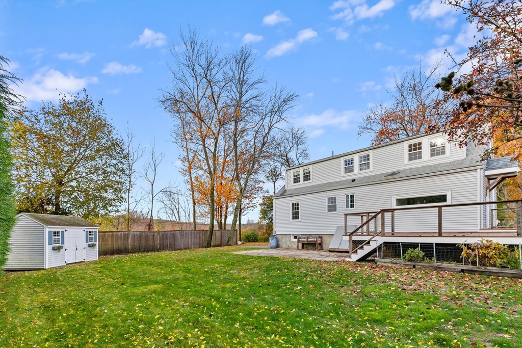 10 Wolcott Street Wakefield, MA 01880 - Photo 38 of 42 a view of a house with backyard