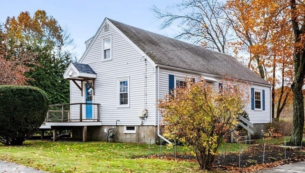 10 Wolcott Street Wakefield, MA 01880 - Photo 4 of 42 a view of house with a yard and sitting area