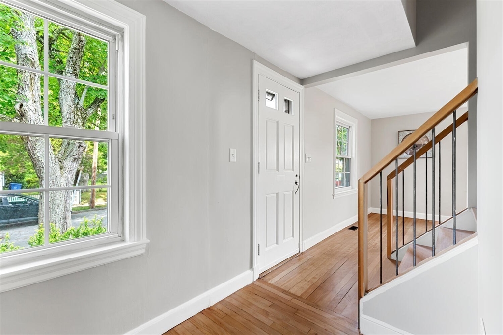10 Wolcott Street Wakefield, MA 01880 - Photo 7 of 42 a view of an entryway with wooden floor