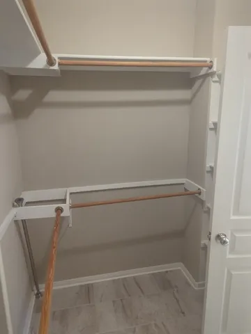 a view of small space with racks on the wall