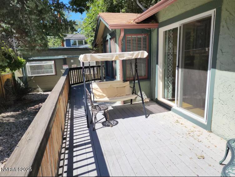 611 Nixon Avenue Reno, NV 89509 - Photo 30 of 43 a view of house with wooden deck and furniture