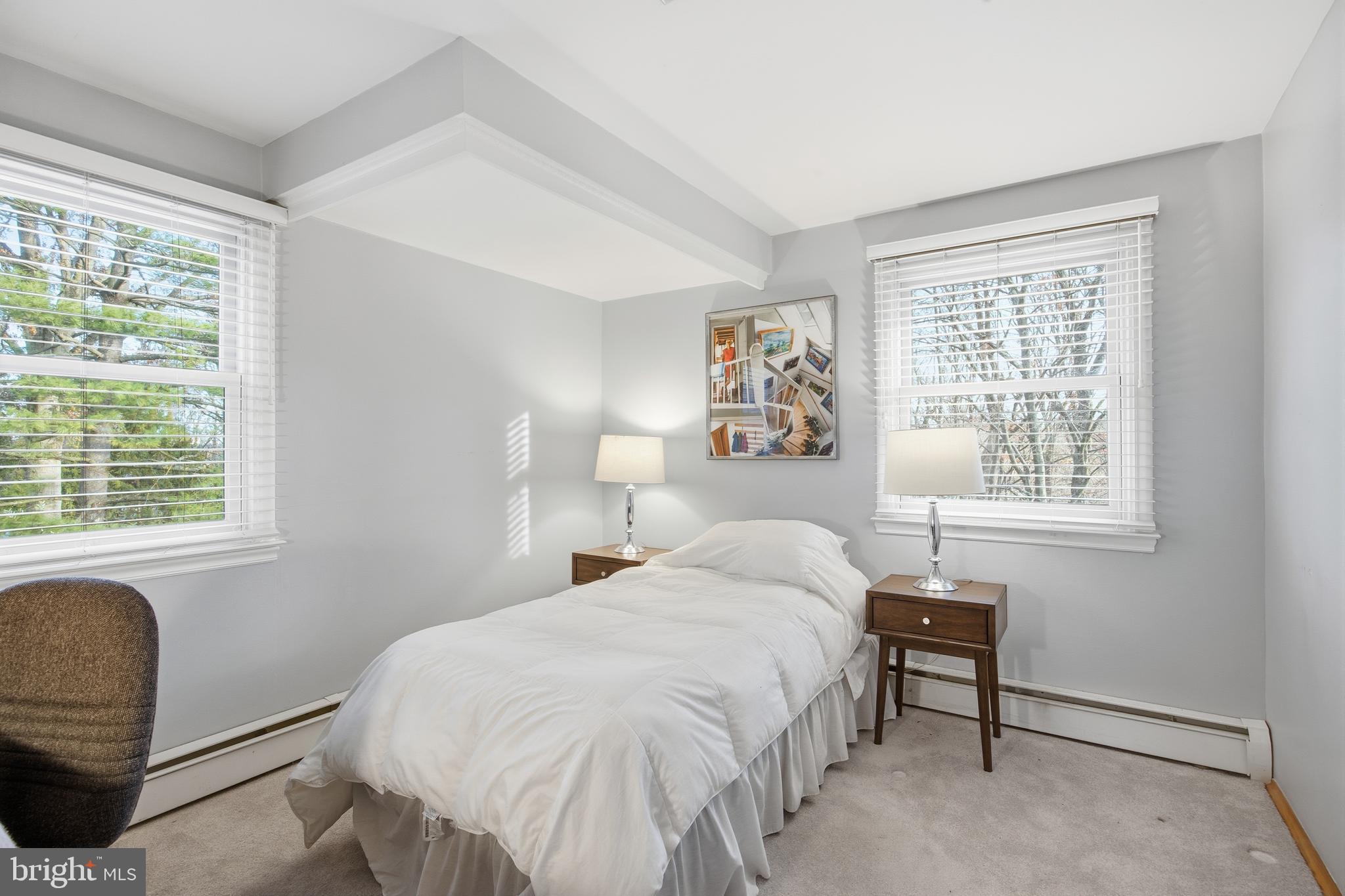 460 Rocksville Road Southampton, PA 18966 - Photo 27 of 59 a bedroom with a bed and a window with chair