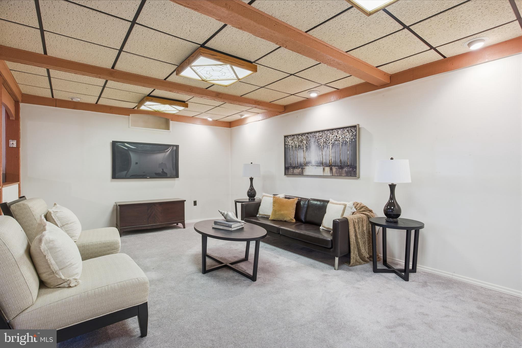 460 Rocksville Road Southampton, PA 18966 - Photo 33 of 59 a living room with furniture and a wooden floor