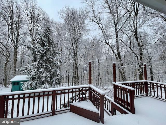 460 Rocksville Road Southampton, PA 18966 - Photo 54 of 59 a view of a roof deck with wooden fence and trees