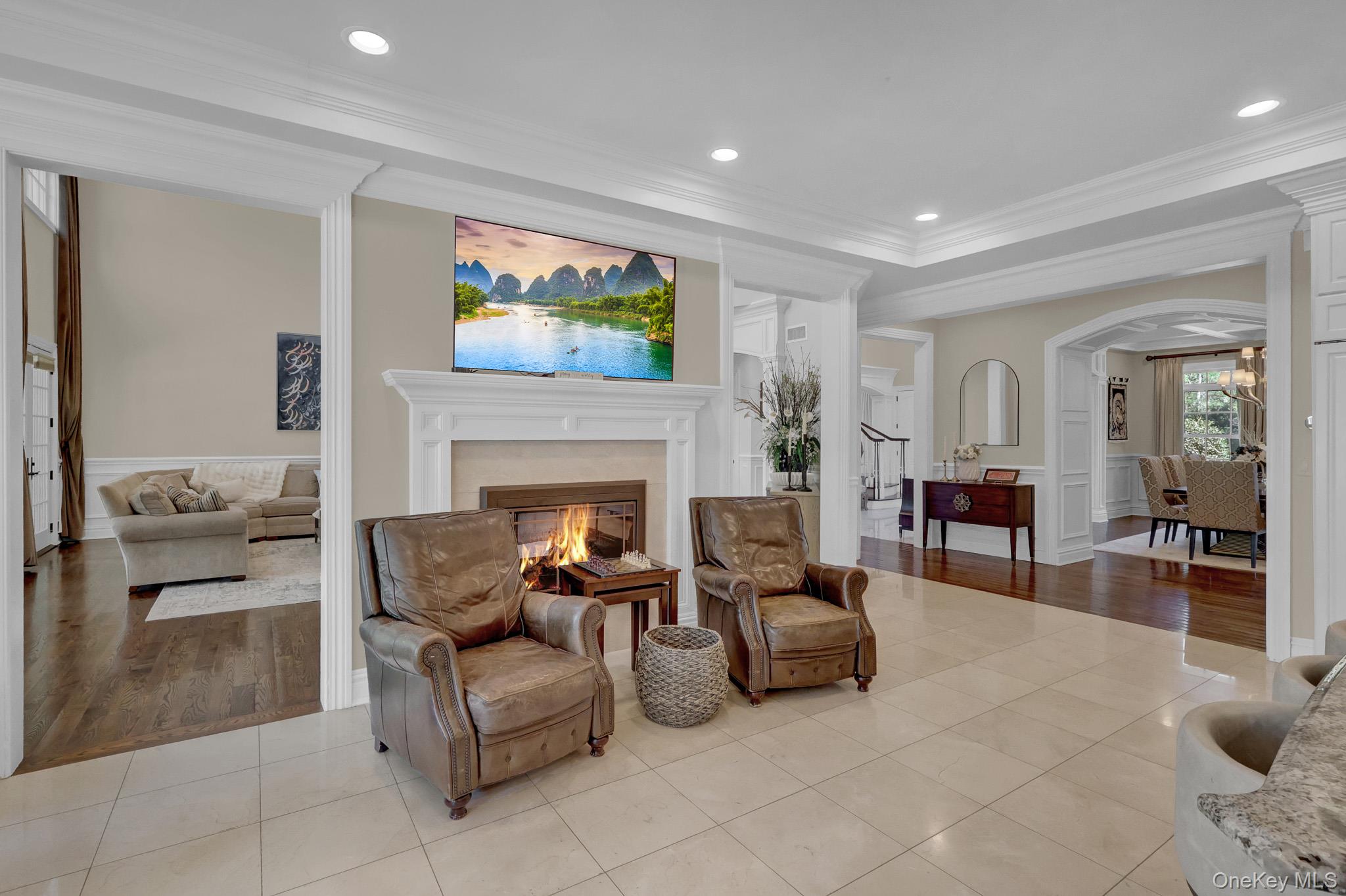 36 Old Field Road Setauket, NY 11733 - Photo 26 of 42 a living room with furniture and a fireplace