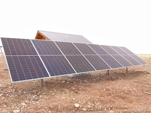 a view of backyard with wooden floor and window