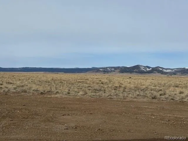 a view of lake with mountain