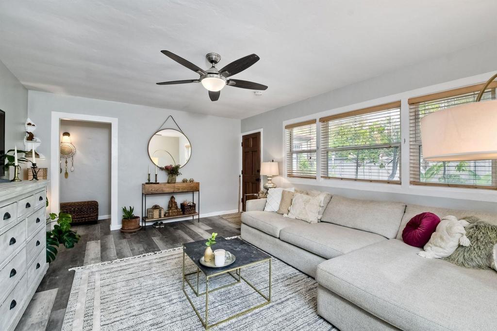 476 La Veta Avenue Encinitas, CA 92024 - Photo 1 of 24 a living room with furniture and wooden floor