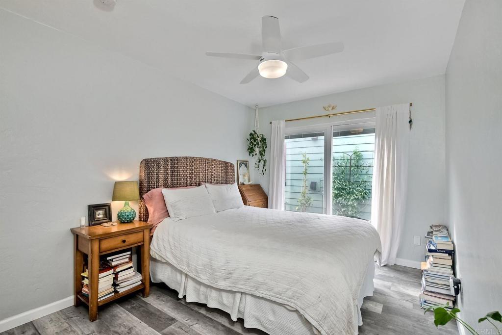 476 La Veta Avenue Encinitas, CA 92024 - Photo 14 of 24 a bedroom with a bed and a window