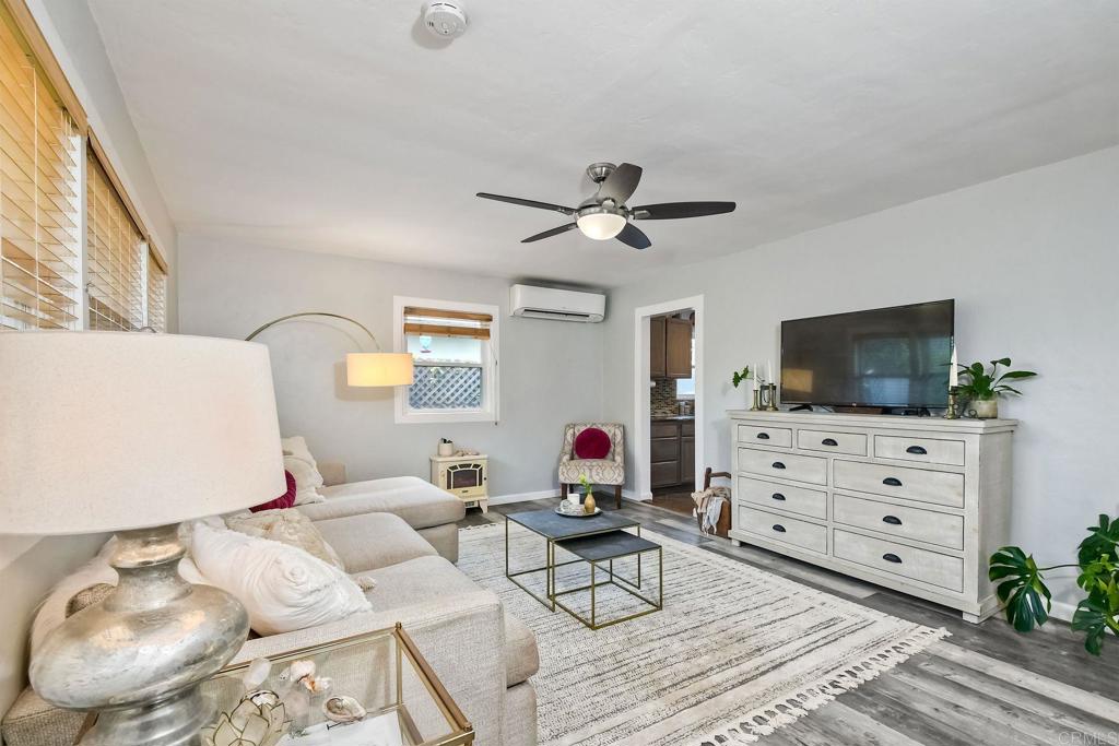 476 La Veta Avenue Encinitas, CA 92024 - Photo 6 of 24 a living room with furniture and a flat screen tv