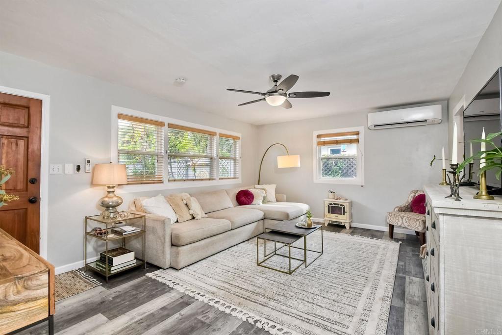 476 La Veta Avenue Encinitas, CA 92024 - Photo 7 of 24 a living room with furniture and a large window