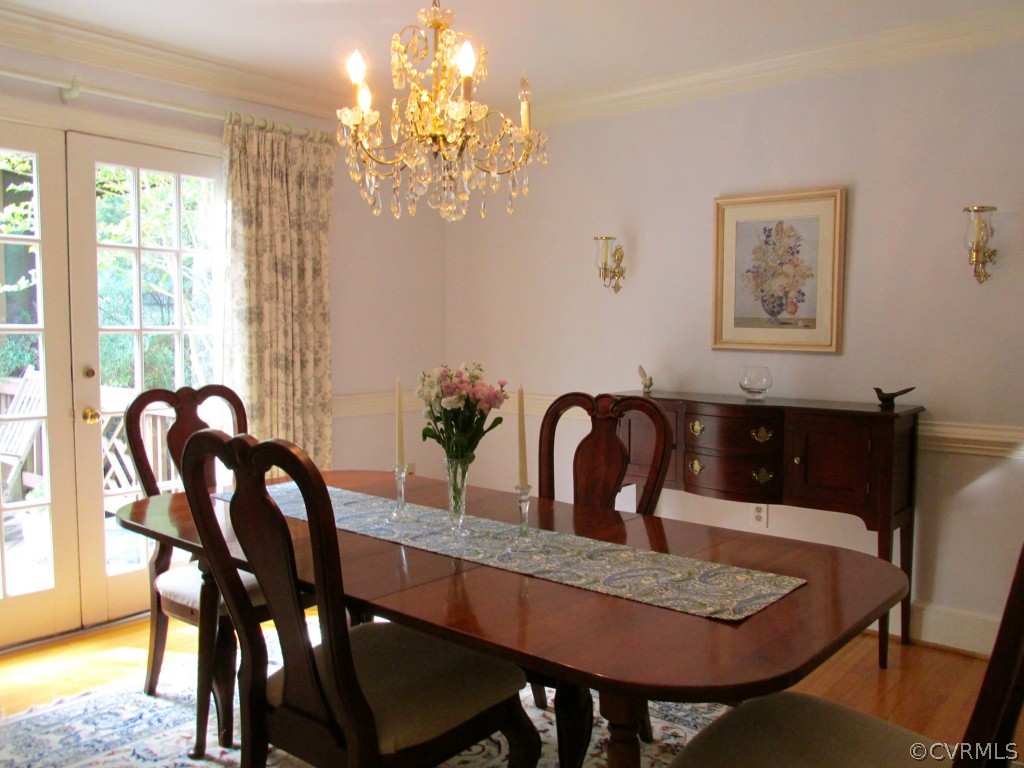 2230 Corner Rock Road Midlothian, VA 23113 - Photo 5 of 24 a view of a dining room with furniture and chandelier