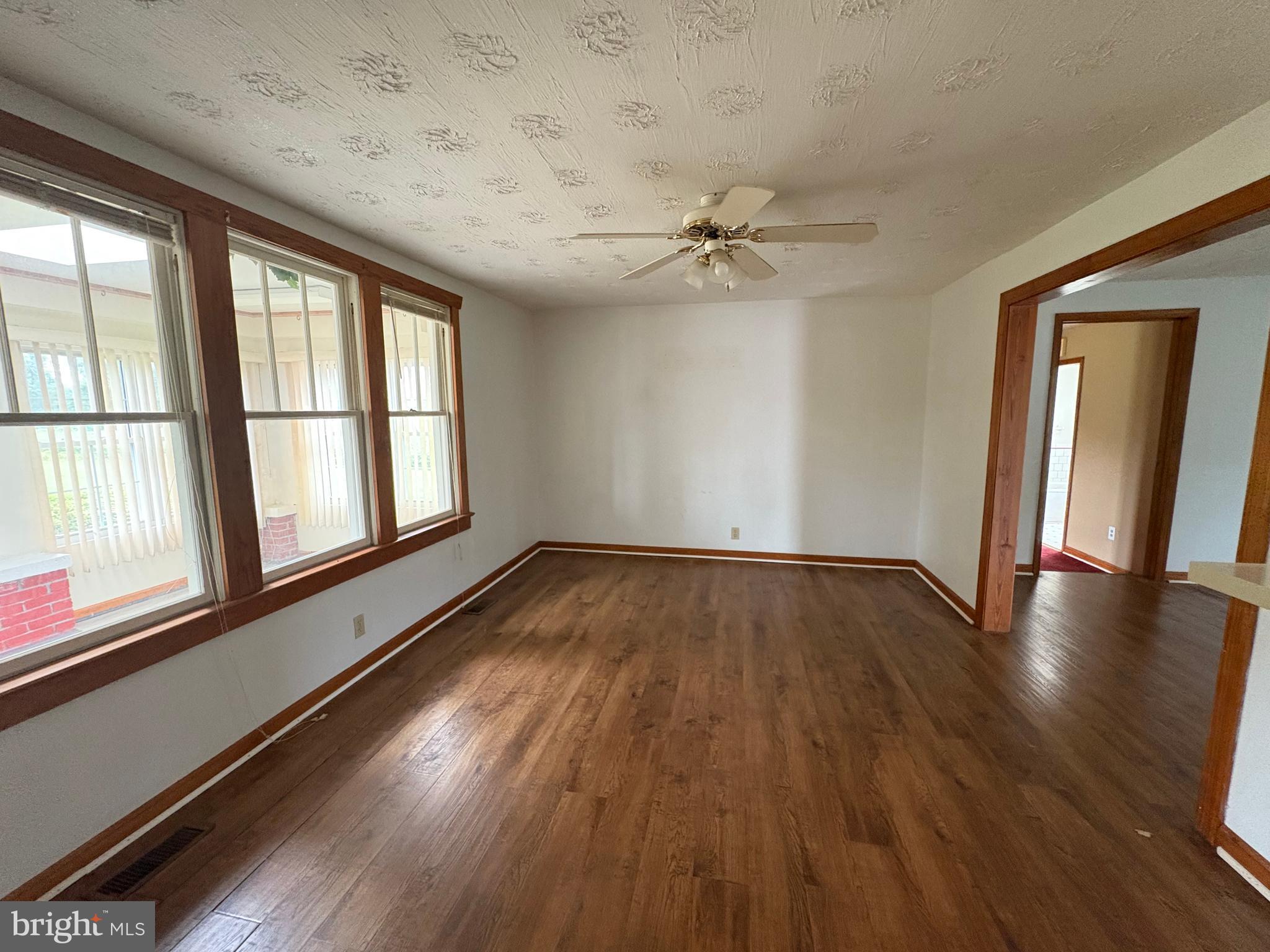 6525 Nomini Hall Road Hague, VA 22469 - Photo 18 of 44 wooden floor in an empty room with a window