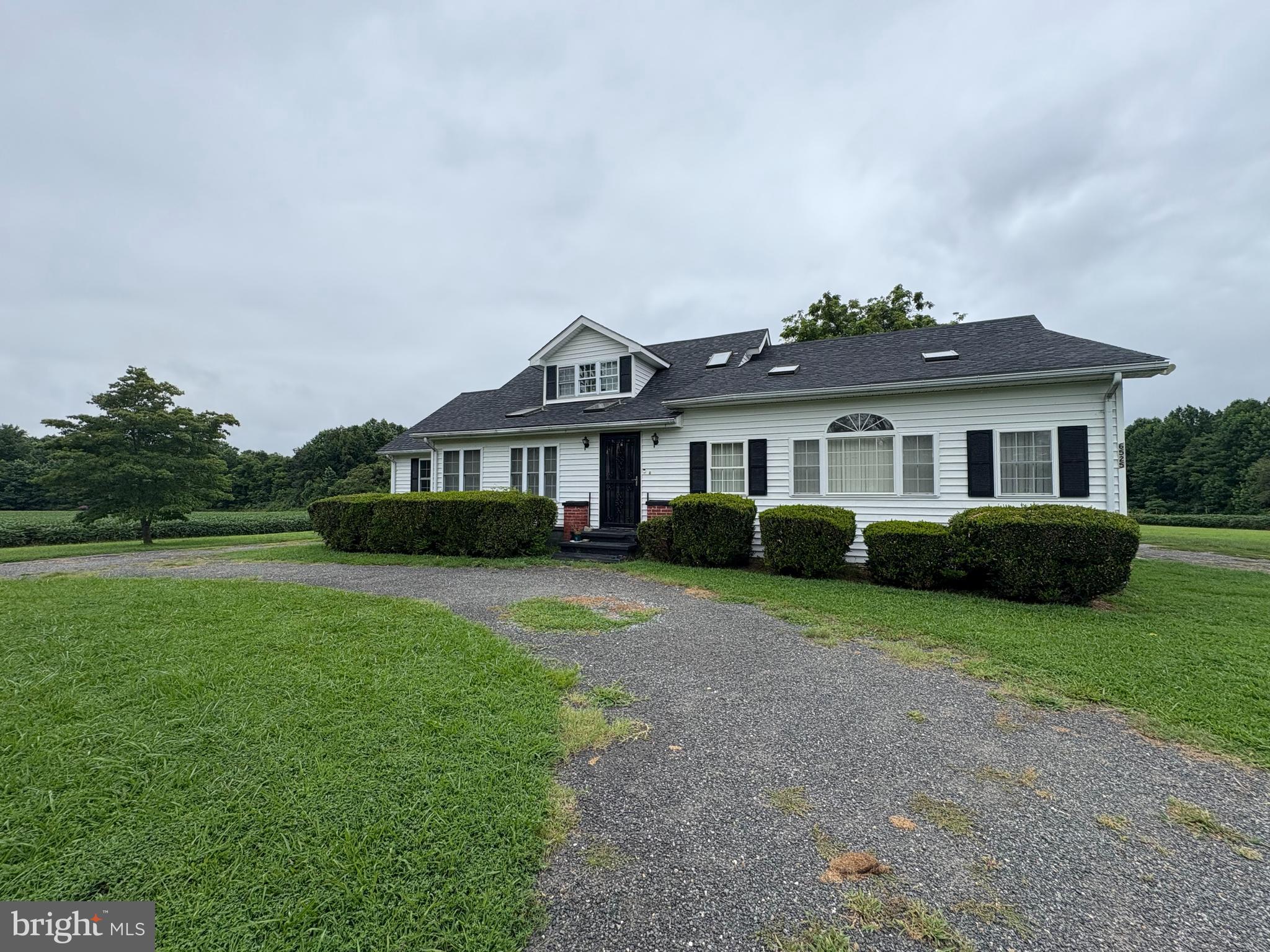 6525 Nomini Hall Road Hague, VA 22469 - Photo 2 of 44 a front view of a house with a yard