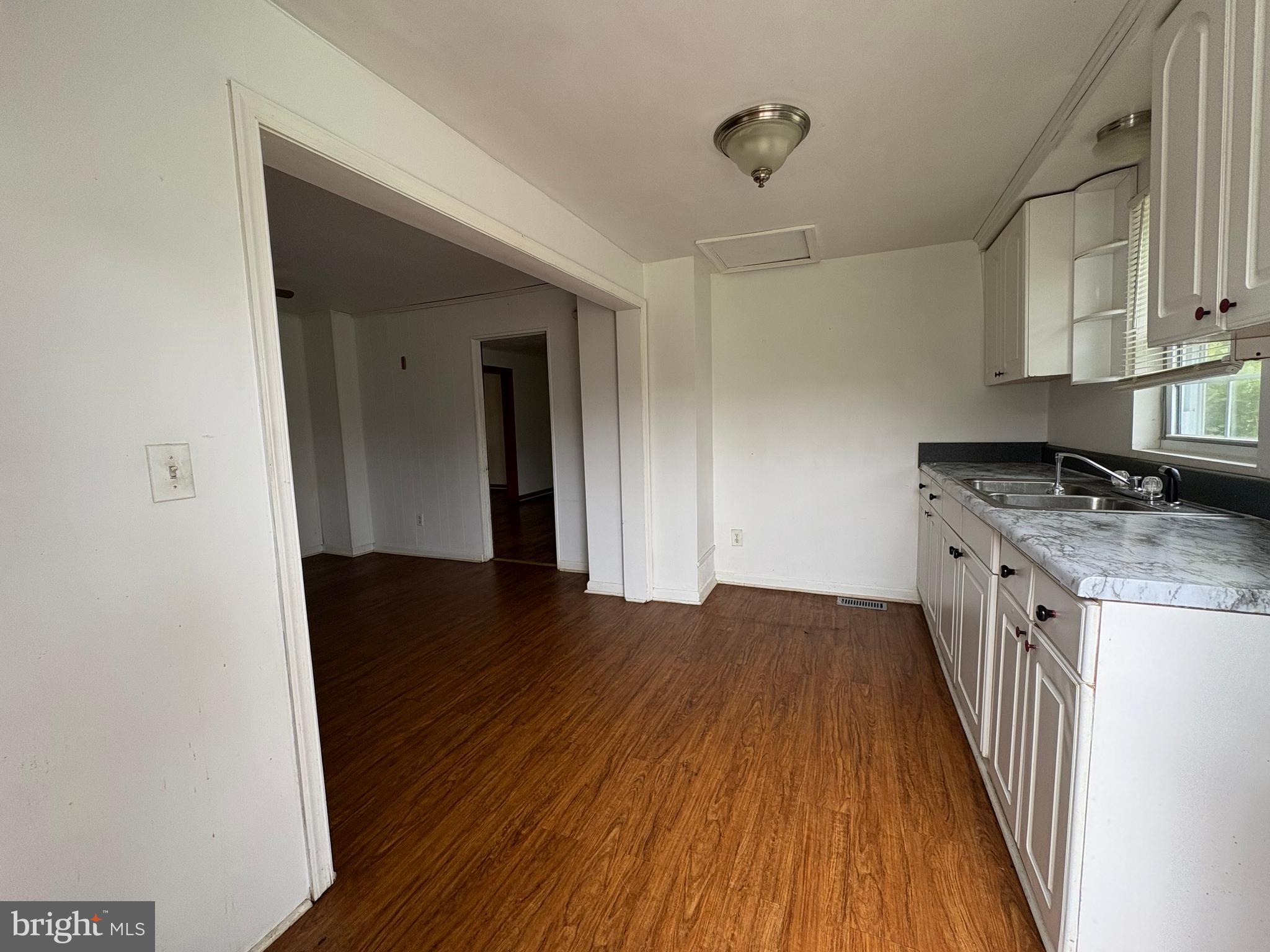 6525 Nomini Hall Road Hague, VA 22469 - Photo 22 of 44 a view of a kitchen from the hallway