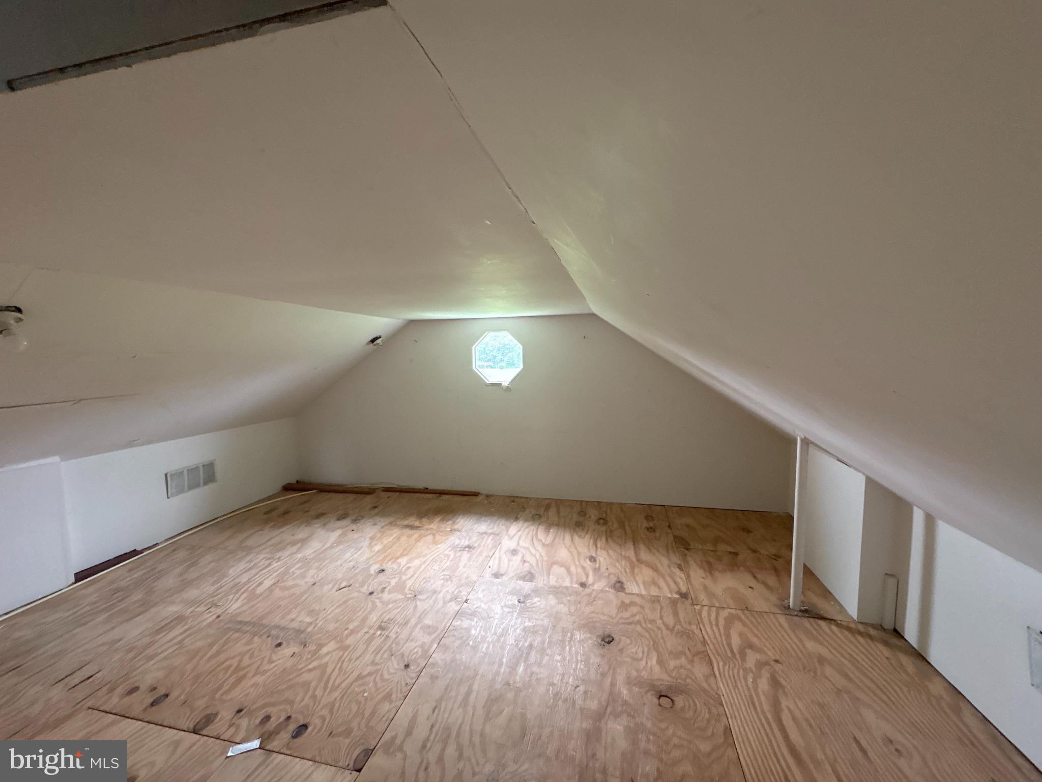 6525 Nomini Hall Road Hague, VA 22469 - Photo 28 of 44 a view of an empty room and wooden floor