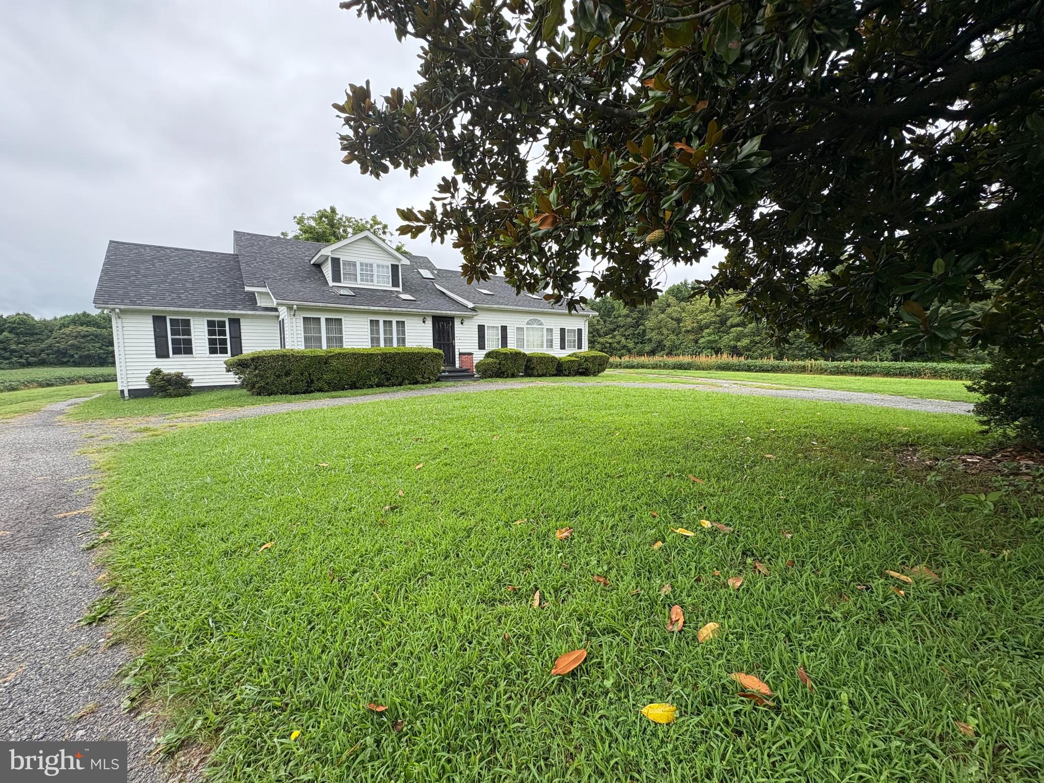 6525 Nomini Hall Road Hague, VA 22469 - Photo 4 of 44 a front view of a house with a garden