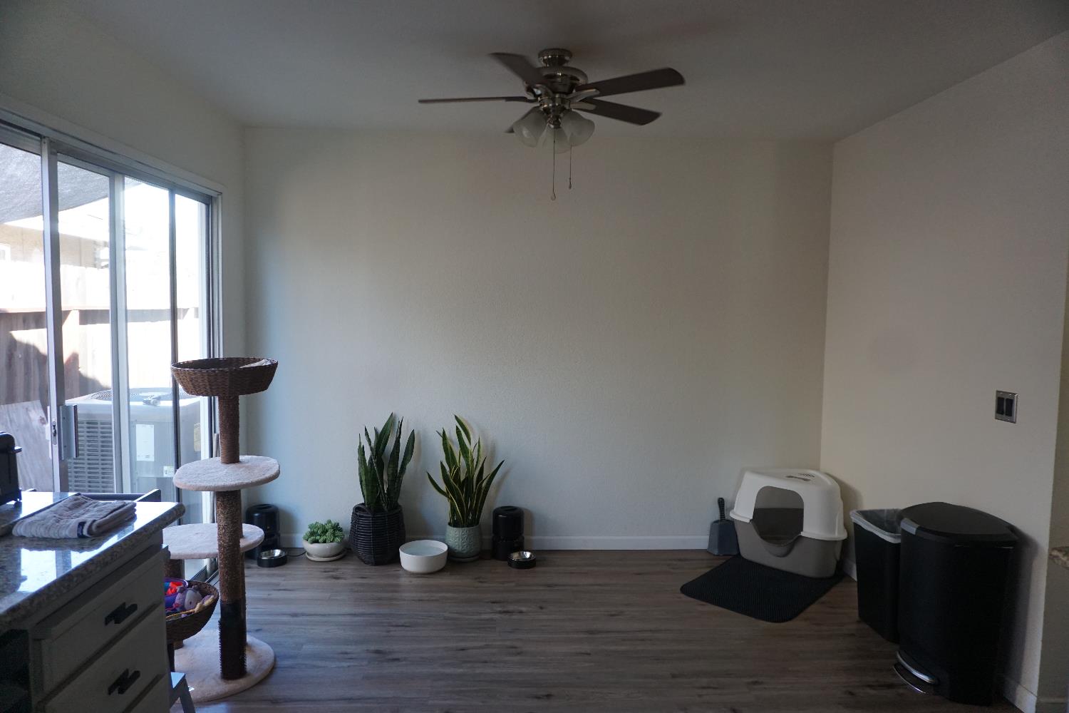 954 Wake Forest Court Merced, CA 95348 - Photo 10 of 36 a view of a workspace with furniture and a window