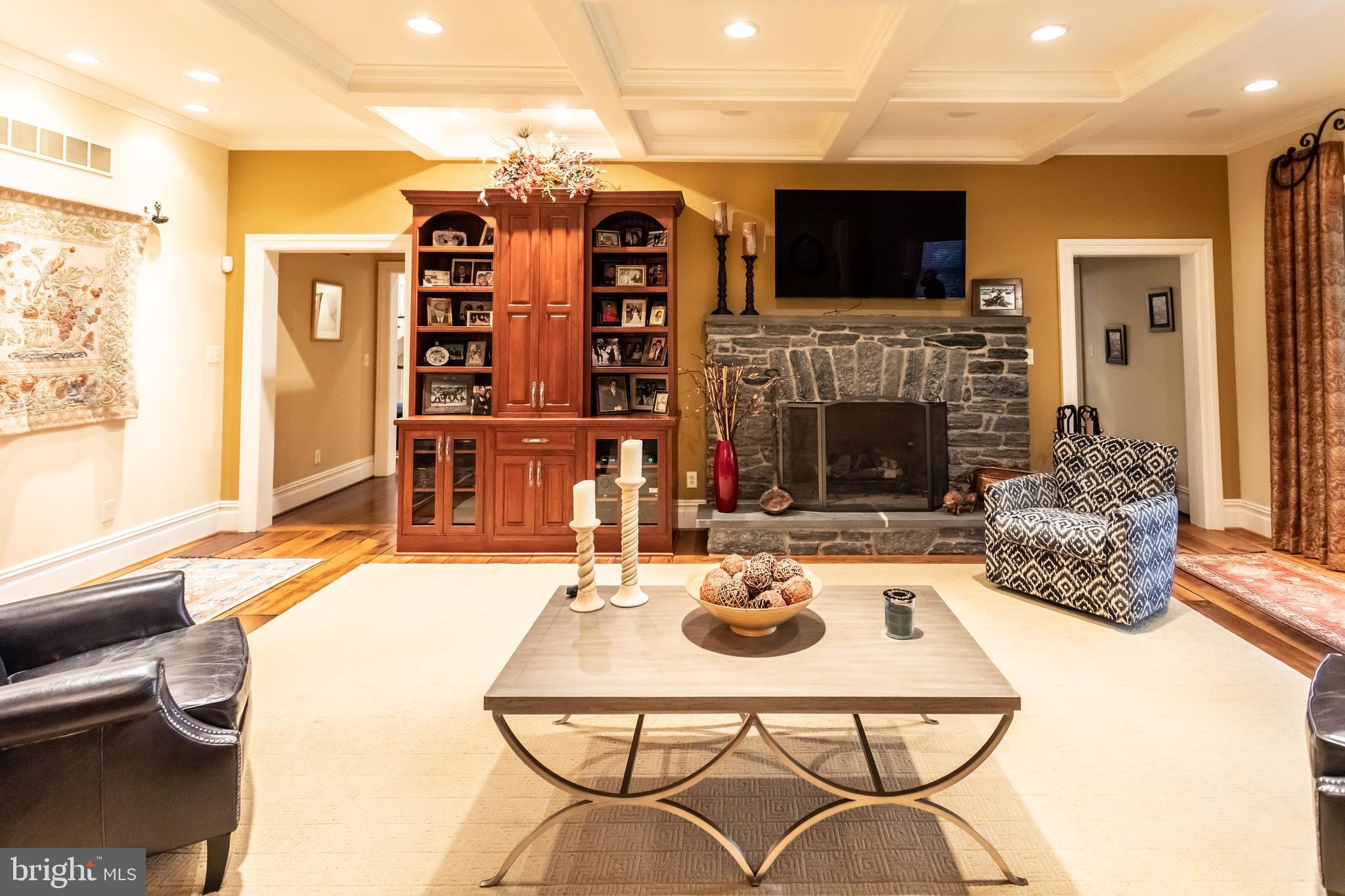 904 Wootton Road Bryn Mawr, PA 19010 - Photo 5 of 38 Family room with coffered ceiling and built-ins