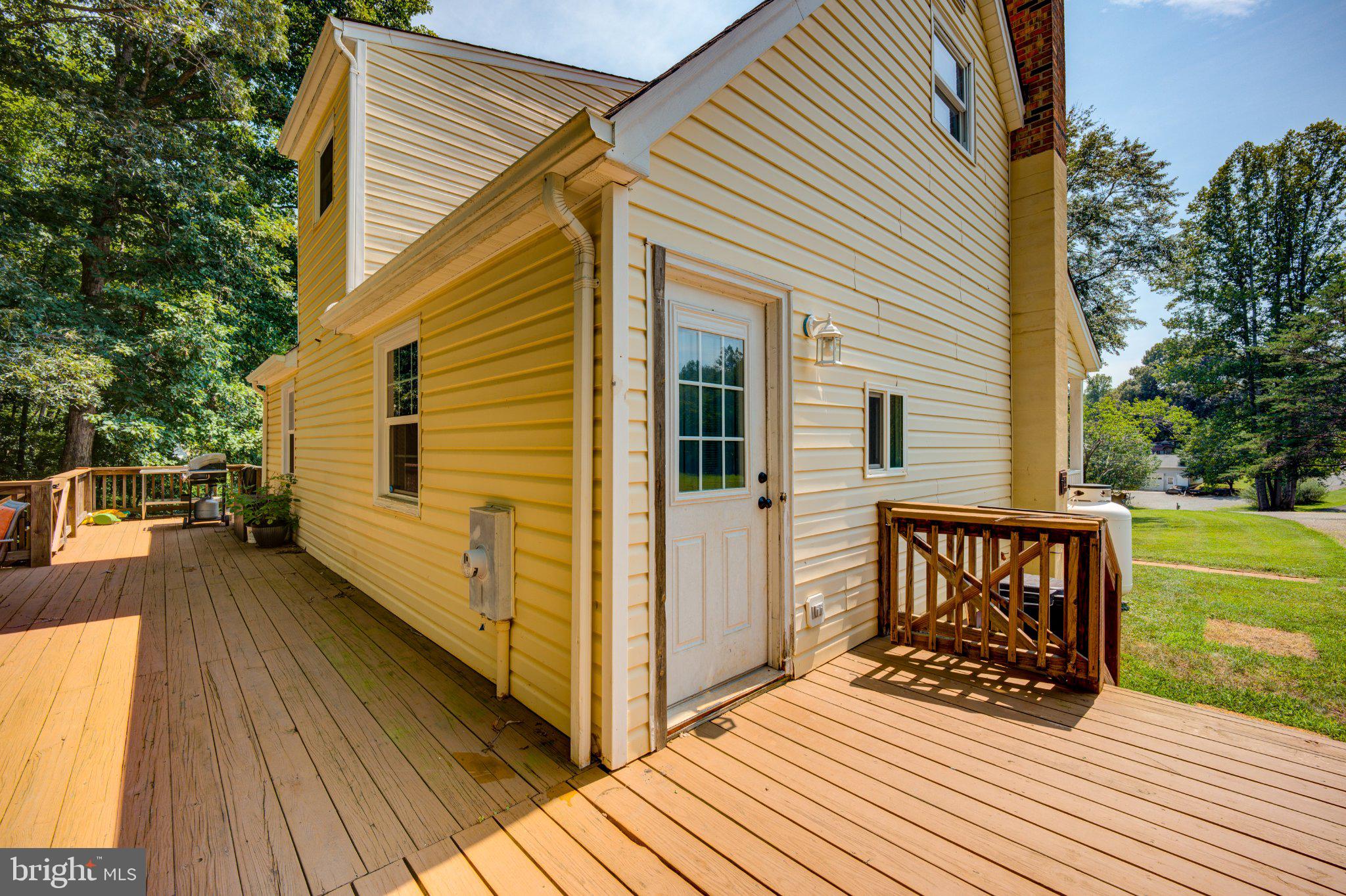 9595 Roys Lane Culpeper, VA 22701 - Photo 52 of 61 Charming yellow home with inviting deck.