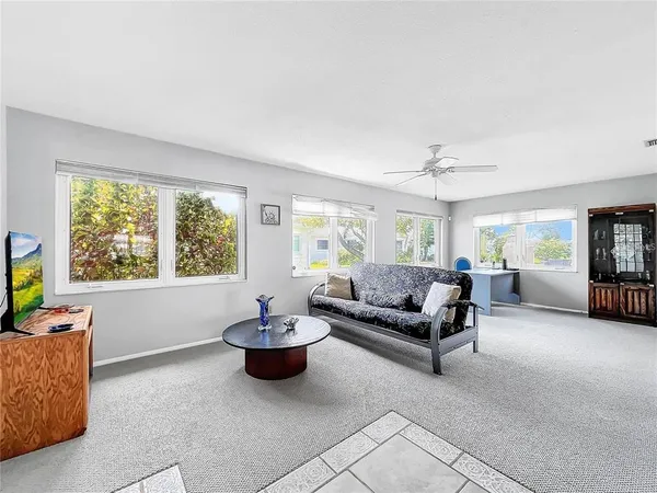 a kitchen with stainless steel appliances granite countertop a stove top oven a sink a counter top space and cabinets