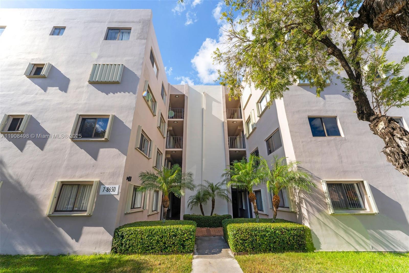 a view of an house with backyard porch and sitting area