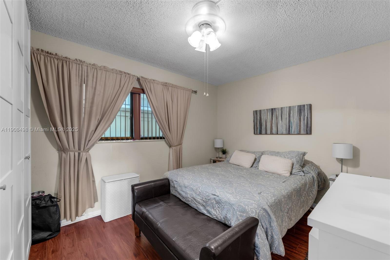 8650 Southwest 133rd Avenue Road, Unit 216 Miami, FL 33183 - Photo 14 of 36 Second bedroom featuring a window that lets in natural light.