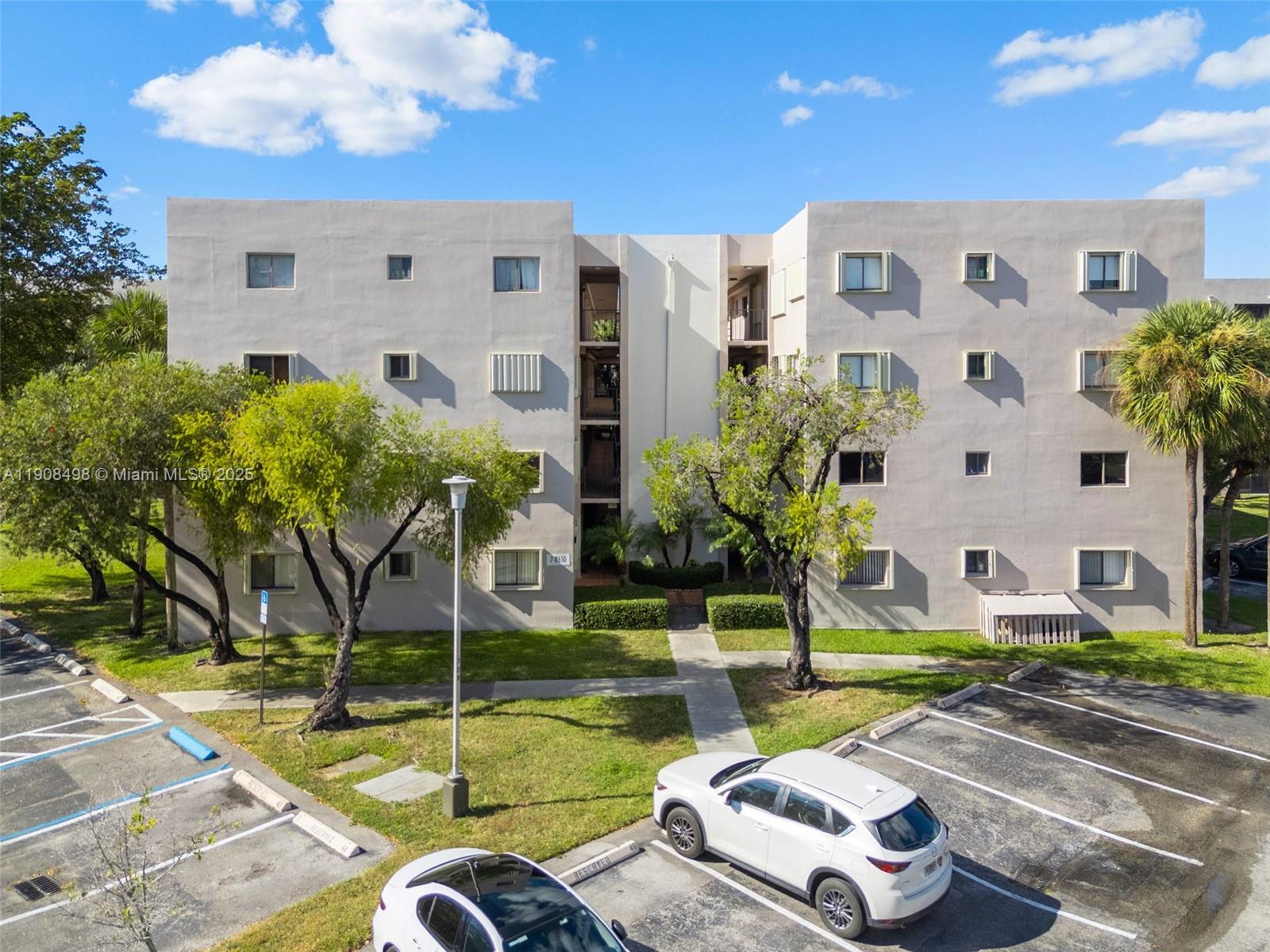 8650 Southwest 133rd Avenue Road, Unit 216 Miami, FL 33183 - Photo 24 of 36 the building where the apartment is located.