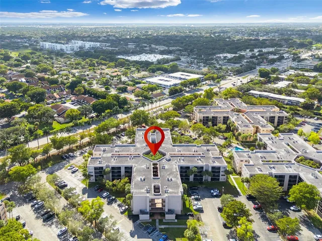 an aerial view of residential building with outdoor space