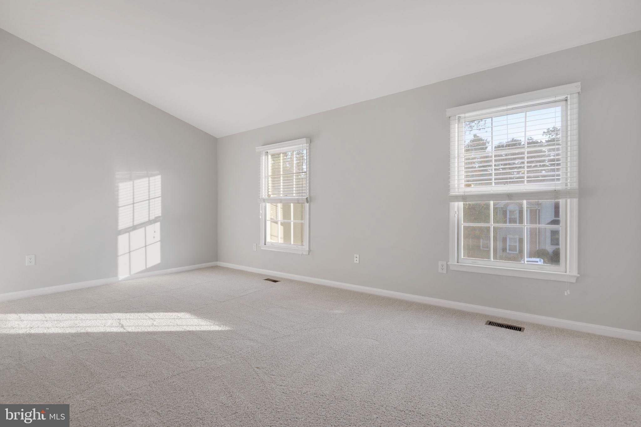7267 Olde Lantern Way Springfield, VA 22152 - Photo 18 of 52 an empty room with windows
