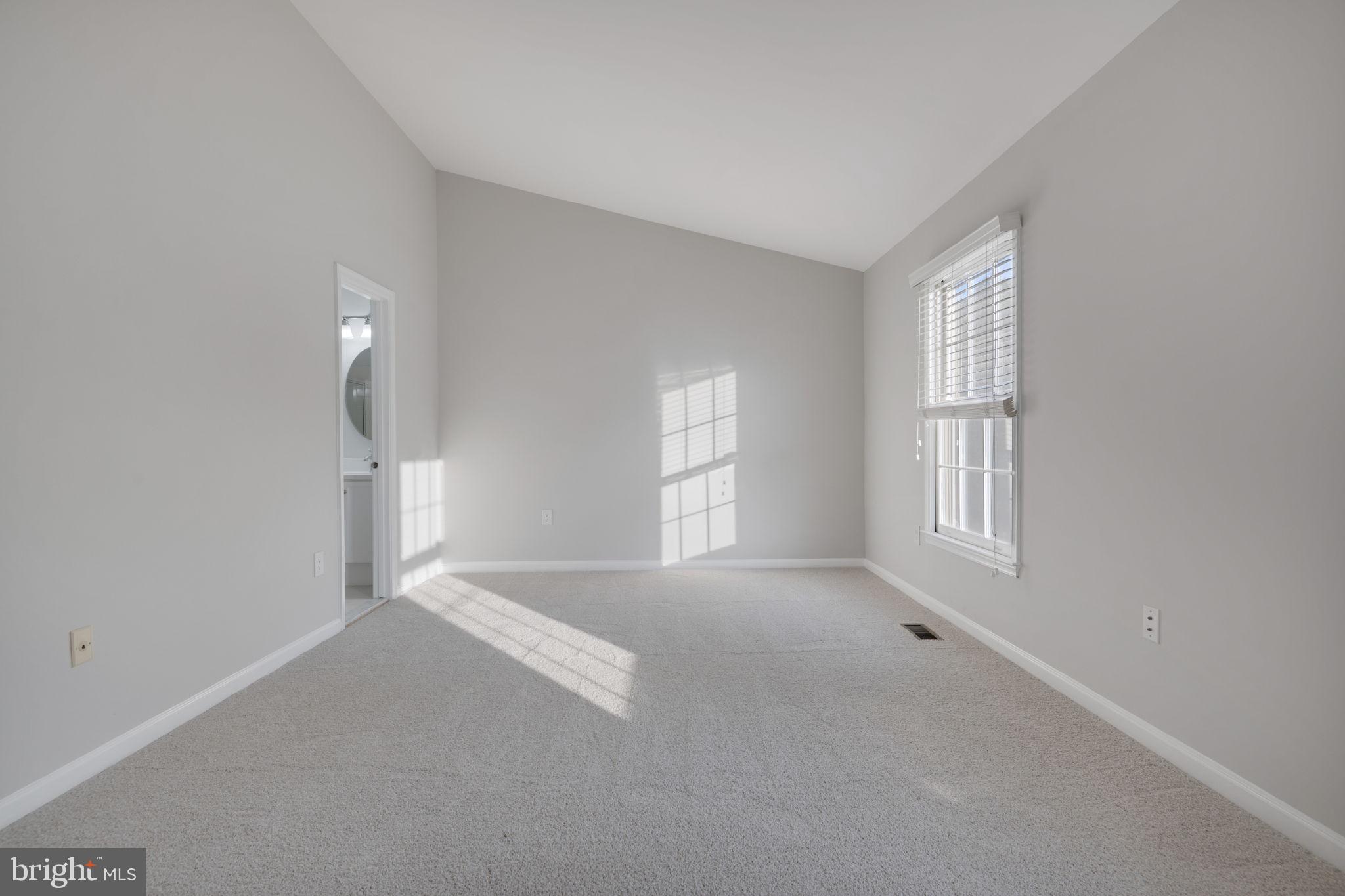 7267 Olde Lantern Way Springfield, VA 22152 - Photo 21 of 52 an empty room with windows and closet