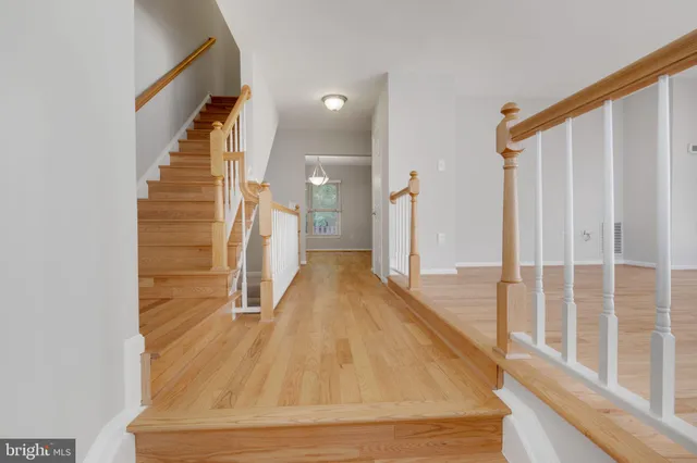 a picture of a bench in front of a building