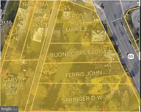 a view of yard with patio